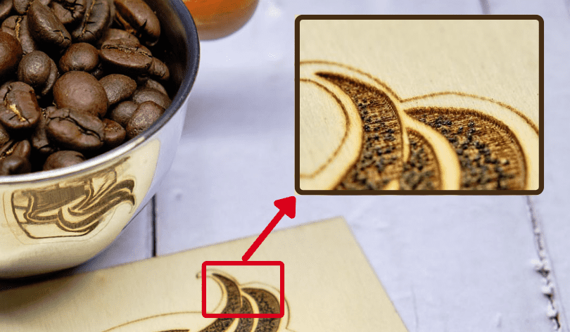 Does Laser Engraving Last - Permanent Laser Engraving on a Wood Coaster with a Closeup on the Engraving showing the Ridges created by the process